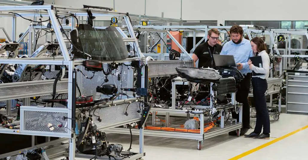 Machine builders working on a machine